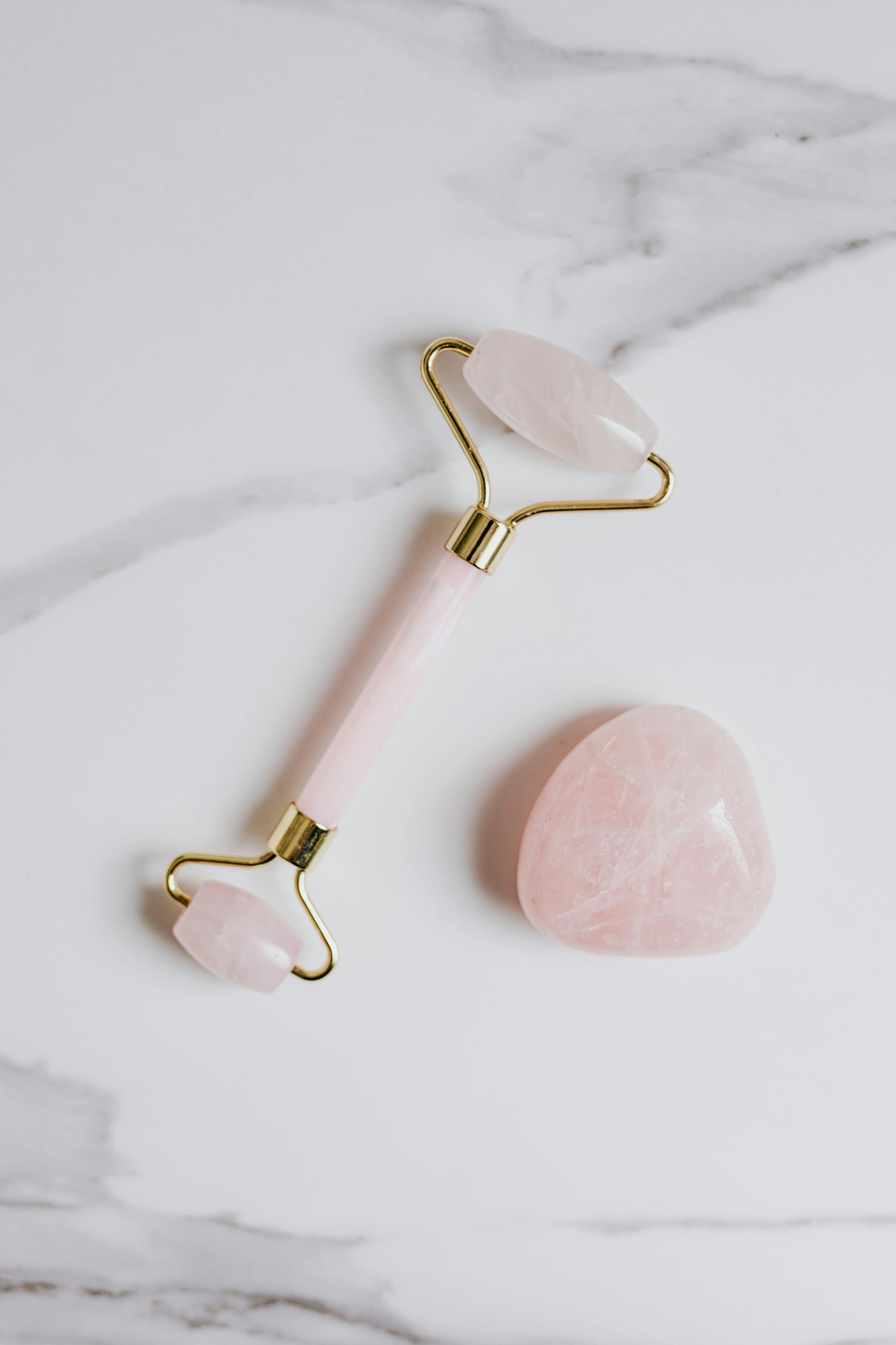 Collection of jade and rose quartz rollers
