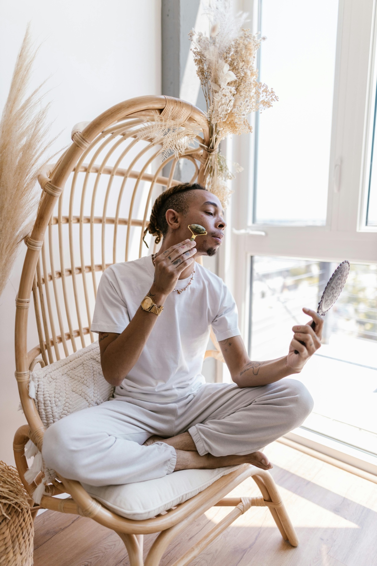 Jade roller with skincare products showing proper usage