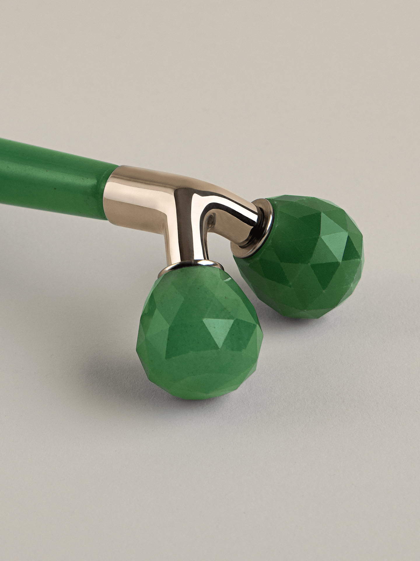 Jade roller applied to the temple during a tension headache