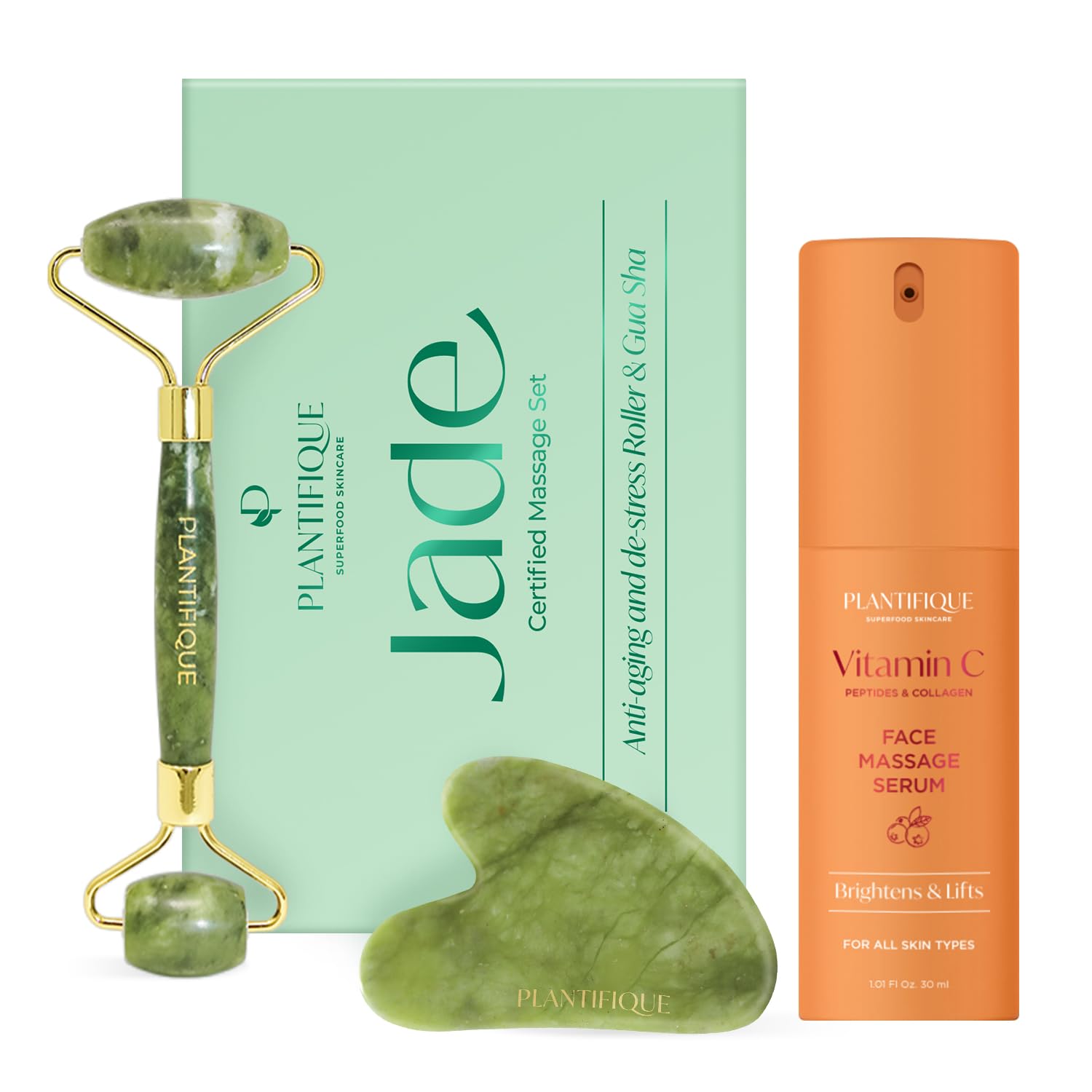 A vitamin C serum bottle next to a jade roller on a bathroom shelf
