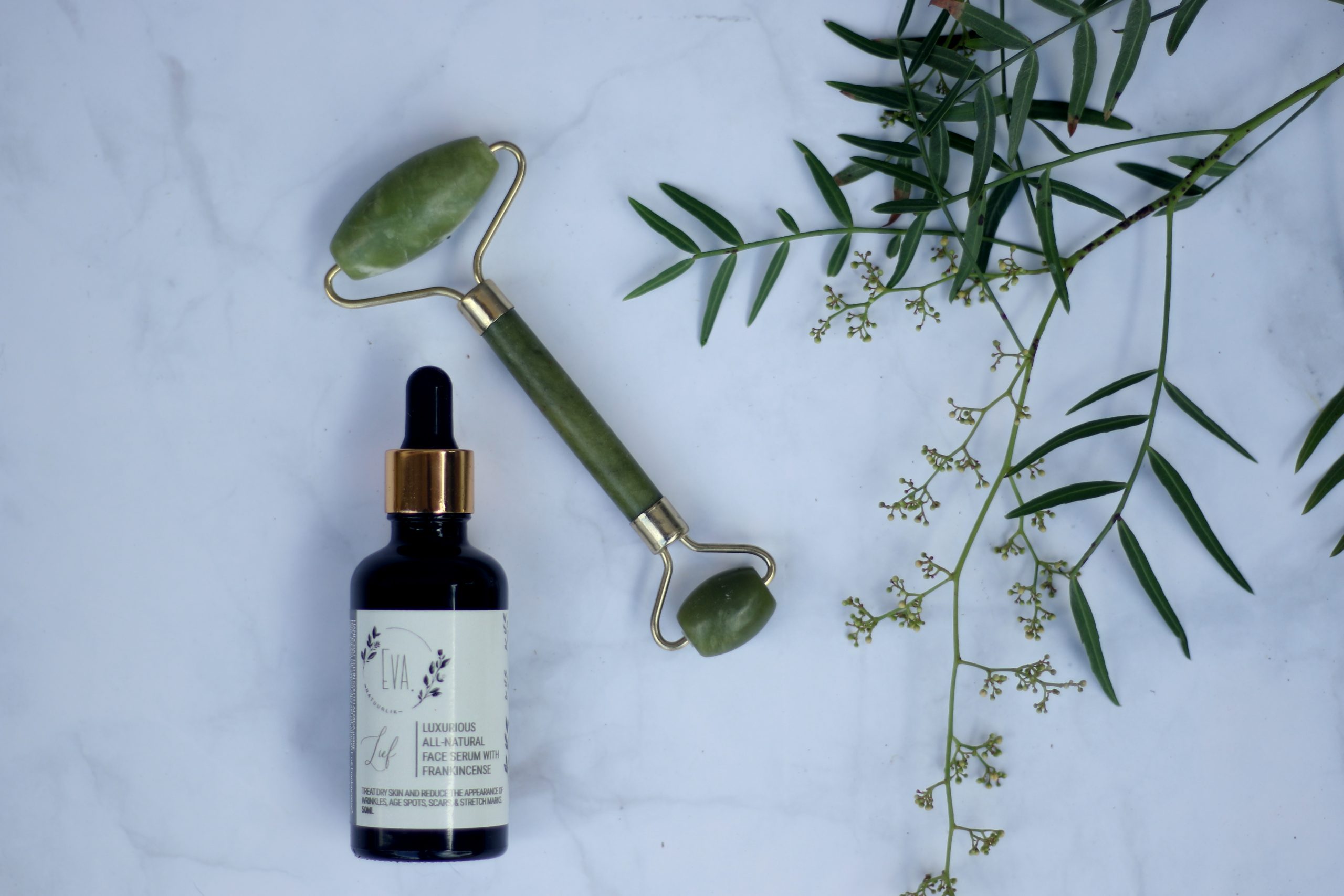 jade roller evening over face serum