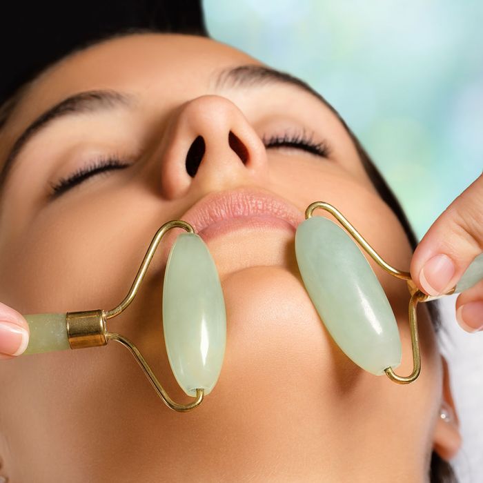 jade roller on lips